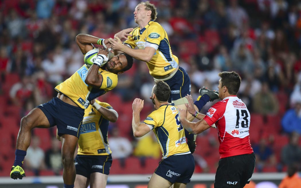 Joe Tomane and Jesse Mogg of the Brumbies take to the sky against he Lions, 2015.