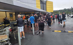 A shortage of supplies is evident, with empty shelves at Pak'nSave in Napier. Queues to get in stretched around the street, with the supermarket limiting the number of people inside at a time.