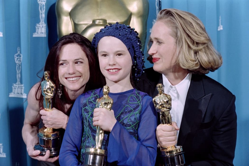 US actress Holly Hunter (L), New Zealand's director Jane Campion (R) and actress Anna Paquin pose with their Oscars after winning respectively the awards for best actress, best original screenplay and best supporting actress for the movie "The Piano" in Los Angeles on March 21, 1994.