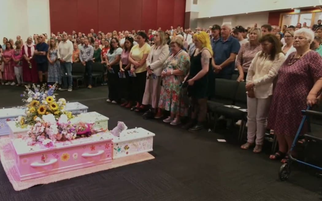 The coffins of August, Hugo, Goldie and Marlo Field.