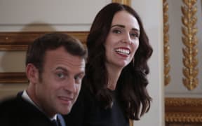 New Zealand's Prime Minister Jacinda Ardern (R) and French President Emmanuel Macron (L) launch Christchurch Call at the Elysee Palace in Paris.