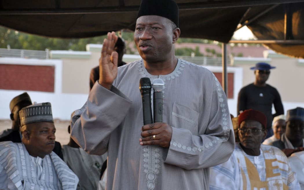 President Goodluck Jonathan speaks to displaced people from Baga in a Maiduguri camp on 15 January.