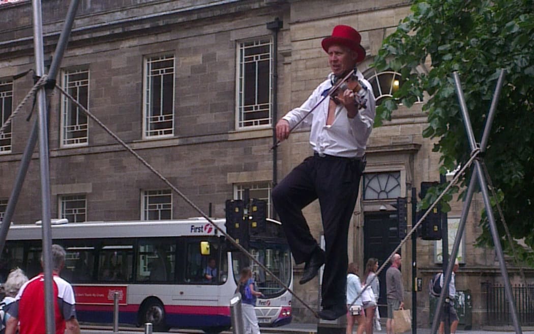 Some buskers at the Commonwealth Games in Glasgow go the extra mile.