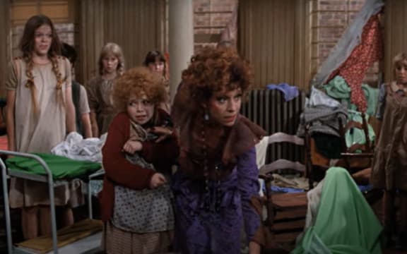 Screengrab from Annie (1982) starring Aileen Quinn as Annie and Carol Burnett as Miss Hannigan