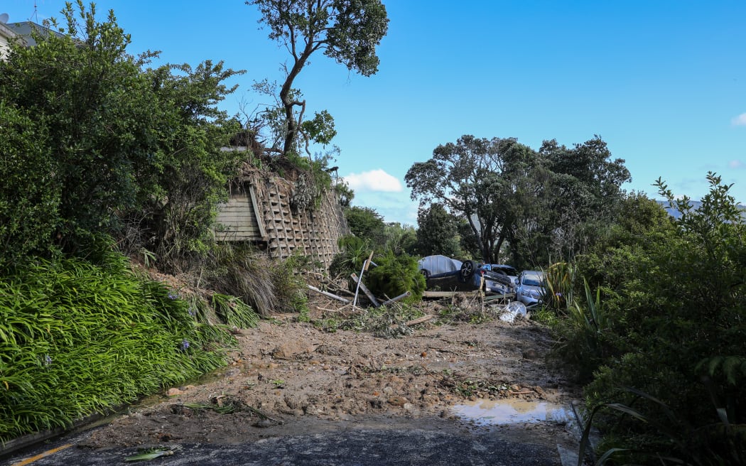 Tairua slip - Motuhoa Road on Mount Paku - a property is extensively damaged as a landslide comes down behind it - 22 January 2026