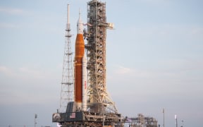NASA’s Space Launch System (SLS) rocket with the Orion spacecraft aboard on the mobile launcher as it is rolled up the ramp at Launch Pad 39B at the Kennedy Space Centre in Florida.