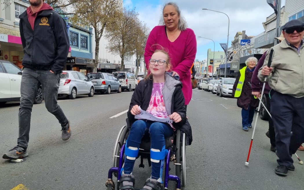 Elizabeth Millen, 11, and mum Stacey are worried about funding cuts.