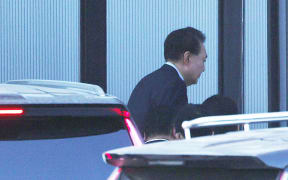 South Korean impeached President Yoon Suk Yeol arrives at the complex building housing the Corruption Investigation Office for High-ranking Officials (CIO) in Gwacheon on 15 January 2025. Yoon said on January 15 that he had decided to submit to questioning over his failed martial law bid to avert "bloodshed" even though he believed the probe was illegal. (Photo by YONHAP / AFP) / - South Korea OUT / NO USE AFTER JANUARY 25, 2025 02:24:56 GMT -  - SOUTH KOREA OUT / NO USE AFTER JANUARY 25, 2025 02:24:56 GMT -  - SOUTH KOREA OUT / NO ARCHIVES -  RESTRICTED TO SUBSCRIPTION USE