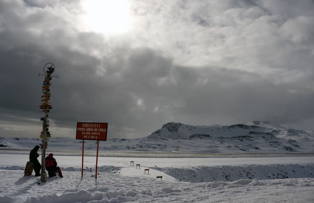 Two Chilean marines take a rest at Chile's military base Presidente Eduardo Frei, in the King George island, in Antarctica, on March 13, 2014.