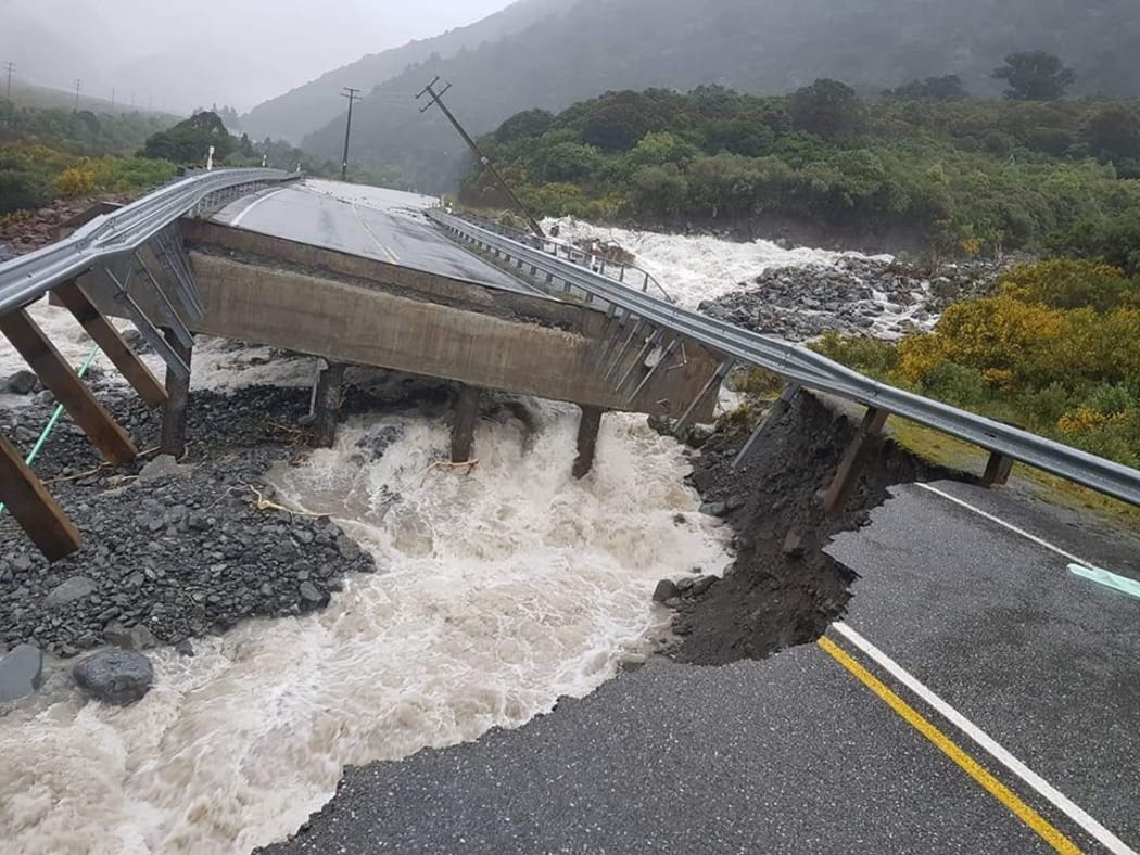 A bridge to Arthur's Pass collapsed after heavy rainfall lashed the West Coast region.