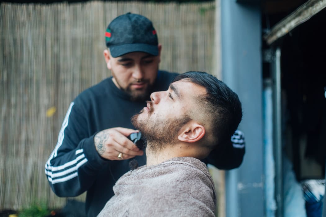Barber Quinten, who goes by Q.