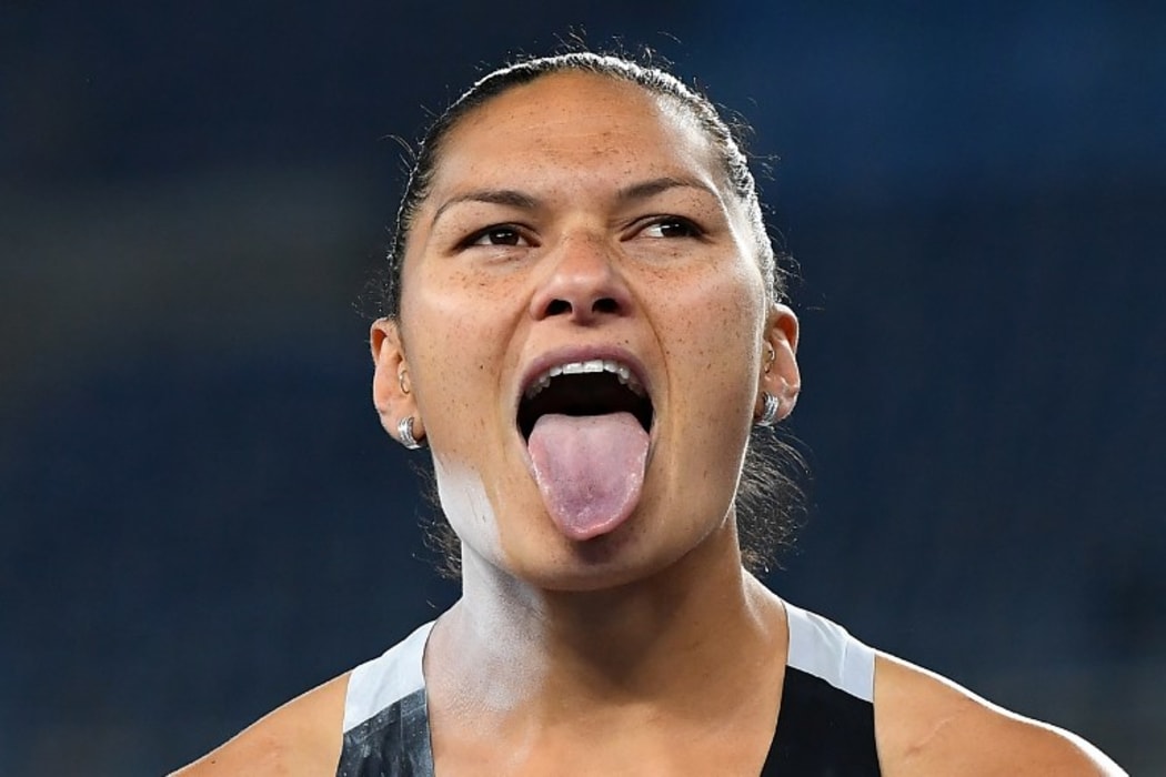 Valerie Adams missed out on a third gold medal after being pipped by the United States' Michelle Carter.