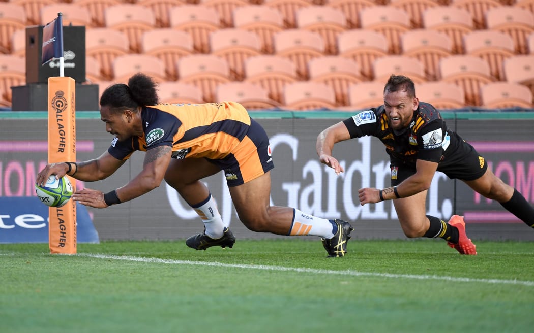 Brumbies wing Solomone Kata scores a try against the Chiefs in Super Rugby.