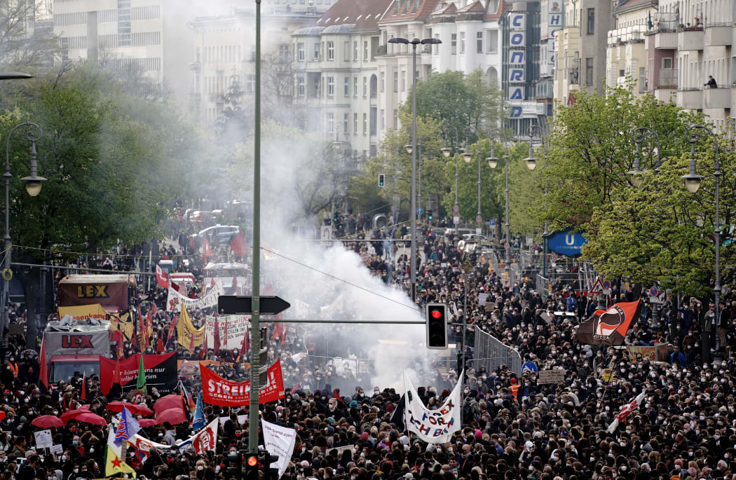 Protesters walk through Berlin, where protests were held in defiance of Covid-19 restrictions.
