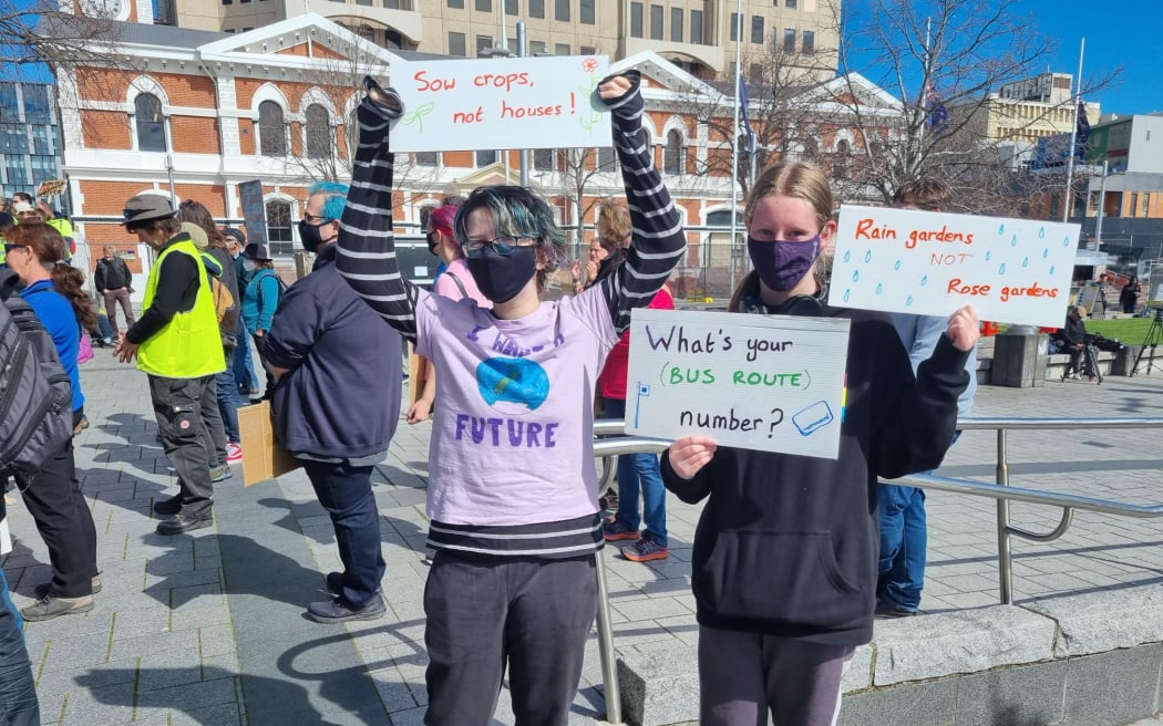 Children hold signs at the School Strike 4 Climate in Cathedral Square, Christchurch.