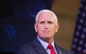 (FILES) In this file photo taken on April 12, 2022 former US Vice President Mike Pence speaks at a campus lecture hosted by Young Americans for Freedom at the University of Virginia in Charlottesville, Virginia. - A lawyer for Mike Pence discovered documents marked as classified at the former US vice president's home last week and turned them over to the FBI, a top lawmaker said on January 24, 2023. Pence "reached out today about classified documents found at his home in Indiana," Republican House oversight committee chairman James Comer said in a statement, adding that the potential 2024 presidential hopeful had agreed to "fully cooperate" with any congressional investigation. (Photo by Ryan M. Kelly / AFP)