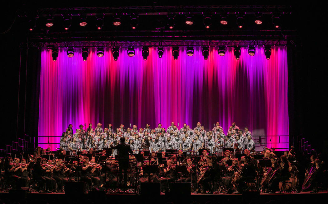 Signature Choir and the NZSO on stage at Spark Arena, Auckland.