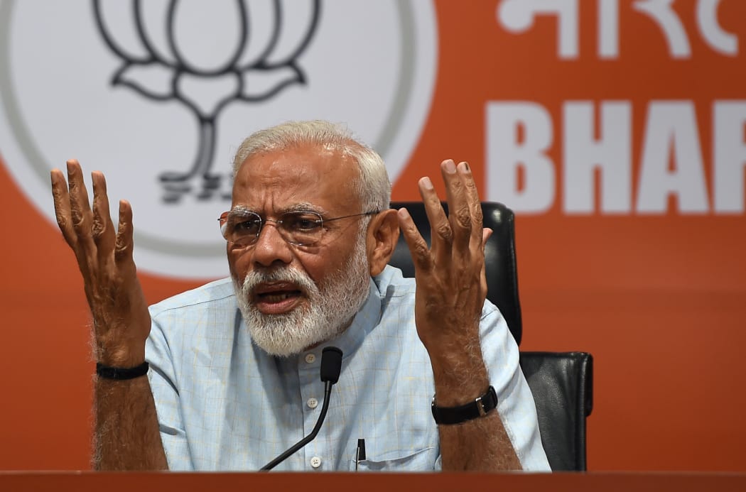 Indian Prime Minister Narendra Modi takes part in a press conference in New Delhi.