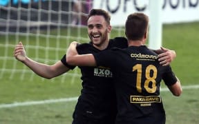 Team Wellington's Tom Jackson celebrates his second goal against AS Magenta.