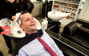Seymour getting a haircut at Rodney Wayne in New Market, Auckland.