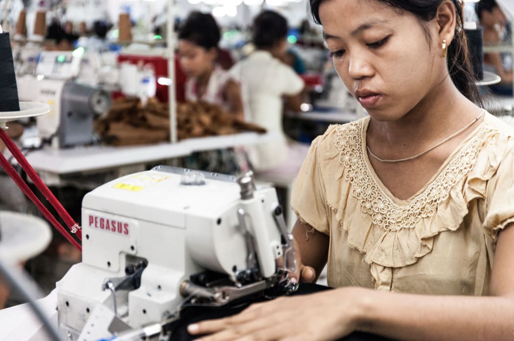 The two investigative journalists found girls as young as 14 working 12 hour days in two factories in Rangoon.