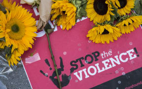 Flowers laid at a makeshift vigil in Orlando for the victims of the deadliest mass shooting in US history.