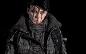 Gary Numan in red paint for his new album 'Intruder'