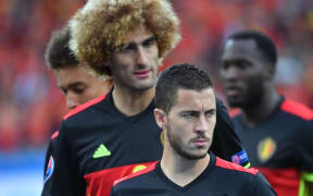Belgium's Marouane Fellaini and Eden Hazard (front) pictured on the field against Italy, in group E of the group stage of the UEFA Euro 2016 European Championships, Monday 13 June 2016 in Lyon, France. BELGA PHOTO DIRK WAEM 
DIRK WAEM / BELGA MAG / BELGA