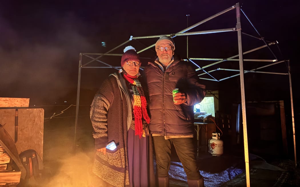 Florence Waaka (Te Arawa, Ngāi Tahu) with John Aramakatu, who has spent the past few months sleeping in the boot of his car in Christchurch’s red zone.