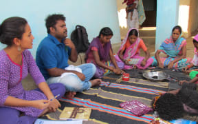 Shreyasi Kumbhar (left) researches in rural Kanha, Central India