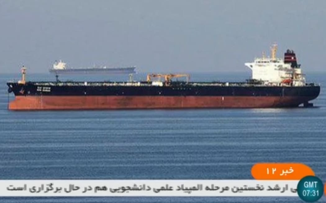 An undated picture obtained by news agency AFP from Iranian State TV reportedly shows the two tankers involved in an incident off the coast of Oman.