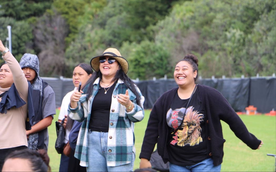 Supporters dancing along to the performances on the Cook Islands stage. day 2 Polyfest 2021.