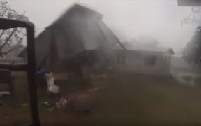 Cyclone Winston tearing a house apart in Tuatua village Koro Island Fiji. Captured by Think Pacific volunteers: http://fijicyclone.thinkpacific.com/