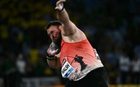New Zealand's Tom Walsh competes in the men's shot put event of the Diamond League athletics meeting at the Olympic stadium in Rome on June 6, 2025. (Photo by Filippo MONTEFORTE / AFP)