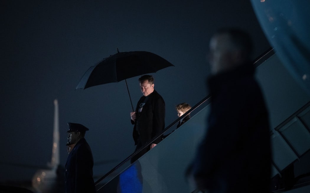 Elon Musk and his son step off of Air Force One in Maryland on March 17.