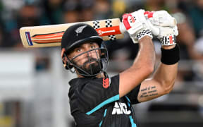New Zealand's Daryl Mitchell hits a six in game one of the international Twenty20 Pakistan. Eden Park.