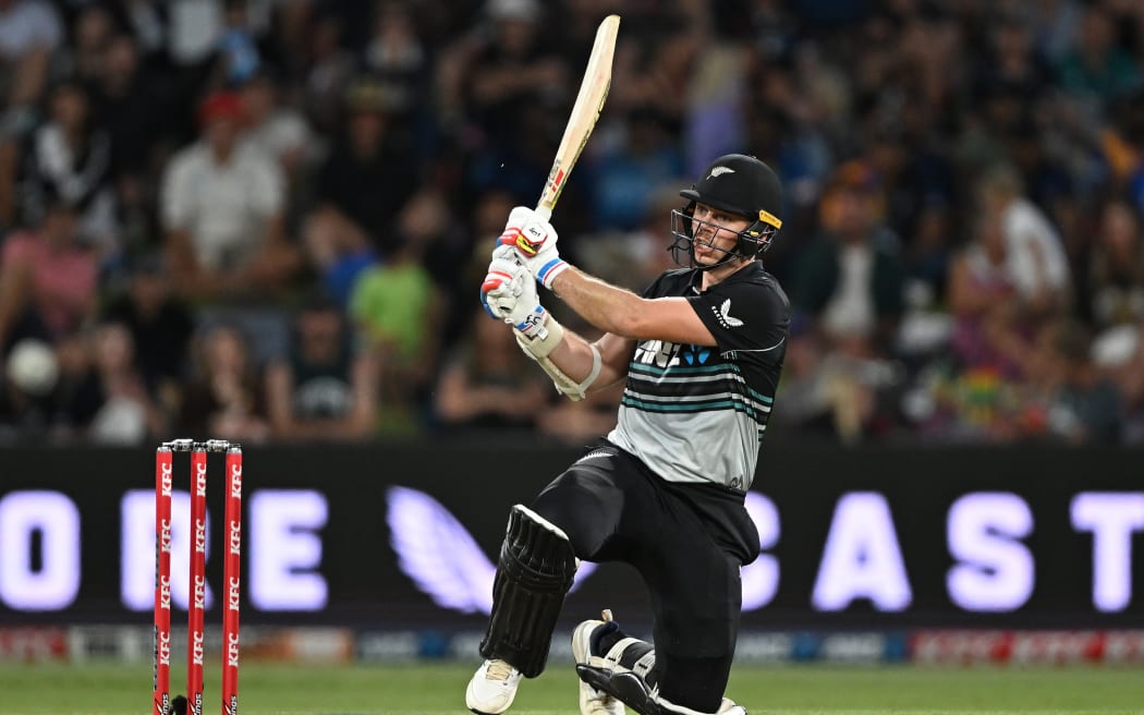 New Zealand's Michael Bracewell hits a boundary during his innings in the first T20 international against Sri Lank at Mt Maunganui, 28 December 2024.