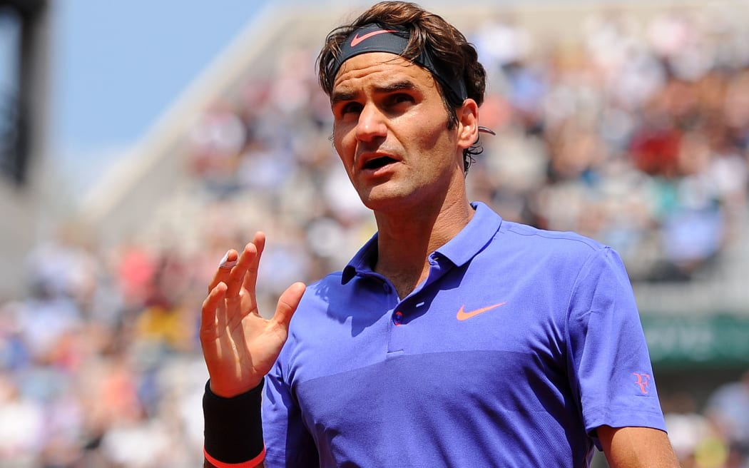 The Swiss second seed Roger Federer has been knocked out of the French Open by compatriot Stan Wawrinka.