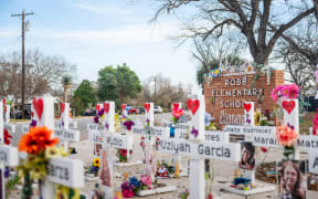 UVALDE, TEXAS - JANUARY 05: A memorial dedicated to the 19 children and two adults murdered on May 24,2022 during a mass shooting at Robb Elementary School is seen on January 05, 2026 in Uvalde, Texas. The first trial over law enforcement's delayed response to the Uvalde school shooting began today with former Uvalde schools officer Adrian Gonzales standing trial in Corpus Christi. Gonzales faces 29 counts of child endangerment. The trial is a rare case in which a law enforcement officer could be convicted for allegedly failing to appropriately respond to criminal activity.   Brandon Bell/Getty Images/AFP (Photo by Brandon Bell / GETTY IMAGES NORTH AMERICA / Getty Images via AFP)