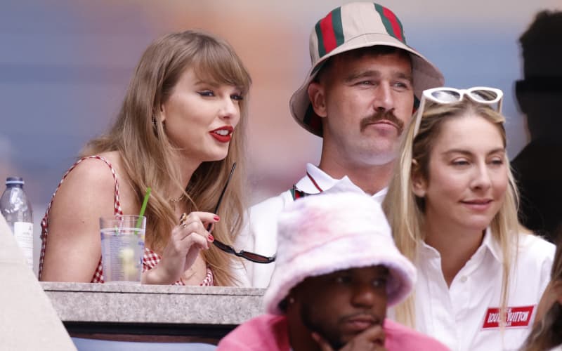 US singer-songwriter Taylor Swift (L) and boyfriend US NFL football player Travis Kelce attend the men’s final match between USA’s Taylor Fritz and Italy’s Jannik Sinner on day fourteen of the US Open tennis tournament at the USTA Billie Jean King National Tennis Center in New York City, on September 8, 2024. (Photo by Kena Betancur / AFP)