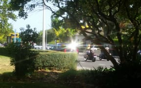 A hearse carrying colourful defence lawyer Eb Leary is escorted from St Mary's Church in Parnell by patched gang members on motorbikes, following a moving service on 12 February 2016.