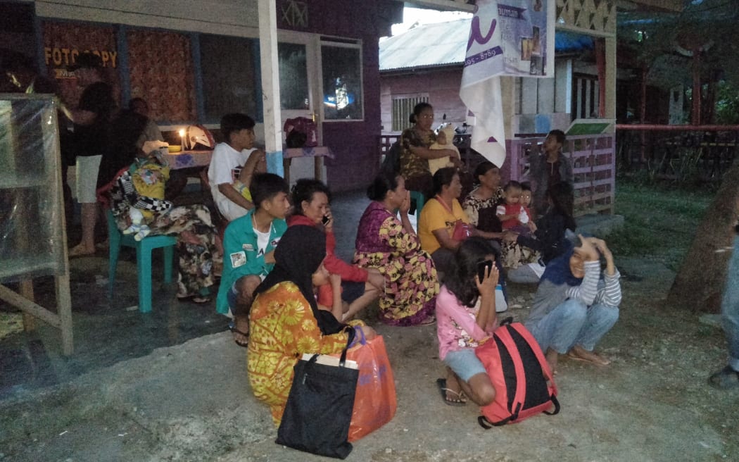 Villagers stay out of their homes following 7.3 magnitude earthquake in Labuha, North Maluku on July 14, 2019.