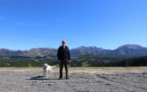 Don McIntosh stands where his dream house once stood before it was destroyed by the 14 November quake.
