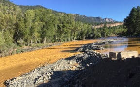 The yellow-coloured Animas River near Durango, Colorado shortly after a toxic waste spill.