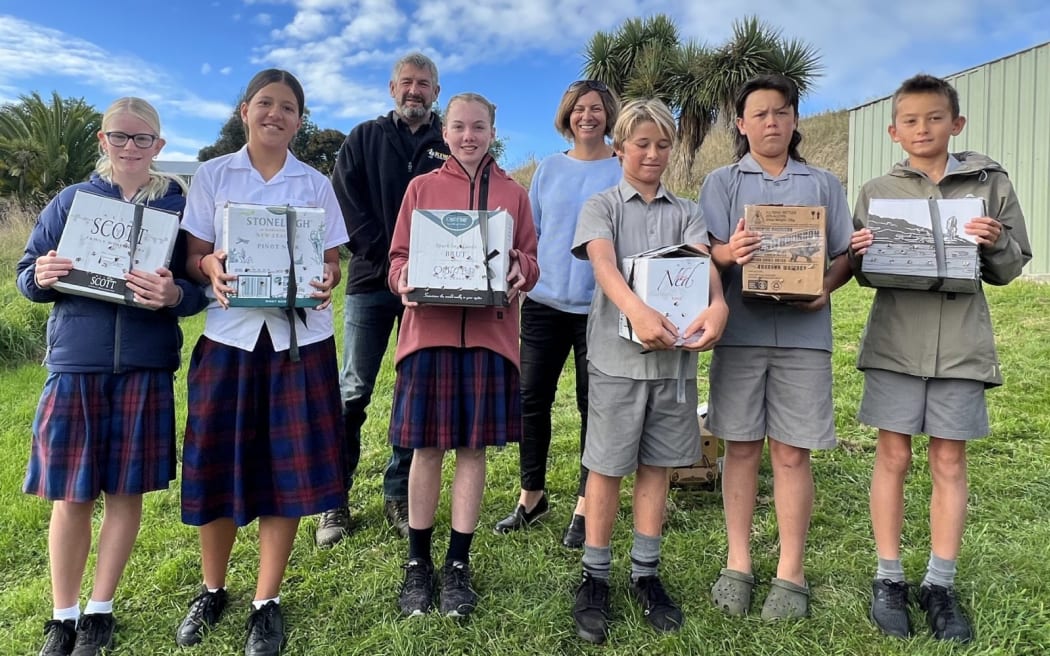 Kaikōura Mayor Craig Mackle (back, left) called in to check on the efforts of volunteers at the Hutton’s shearwater 'Flysafe' hub.