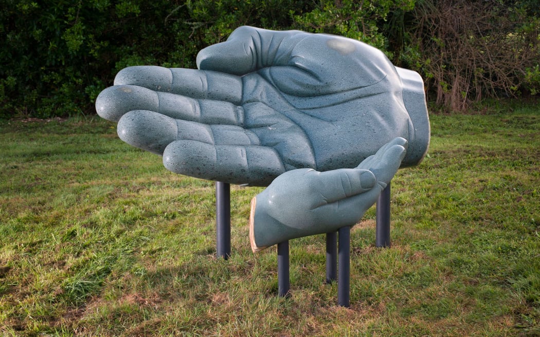 Josh Olley’s large and smooth hand sculptures are a message from a father to his children.