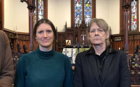 Kate Day of Common Grace, pictured with Debbie Leyland at the launch of a petition to eliminate the power disconnection fees which can add to the debt burden of people struggling and in poverty.