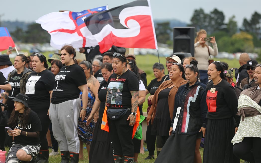 A pōwhiri is underway at Ihumātao as part of the hikoi.