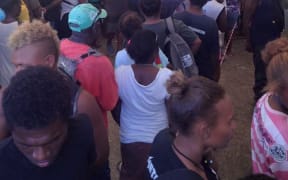 A common scene across Solomon Islands as people line up to register to vote in next year's national and provincial elections. Town Ground, Honiara. September 2018.