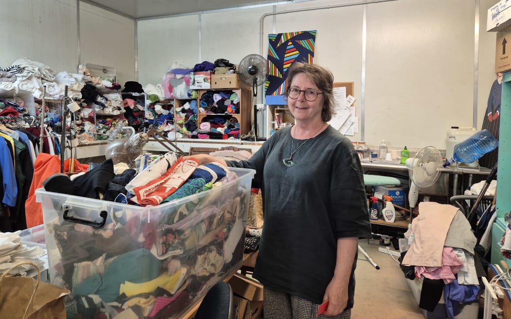 FIXation volunteer sorter Helen Ough Dealy at work in the shop's storeroom. 